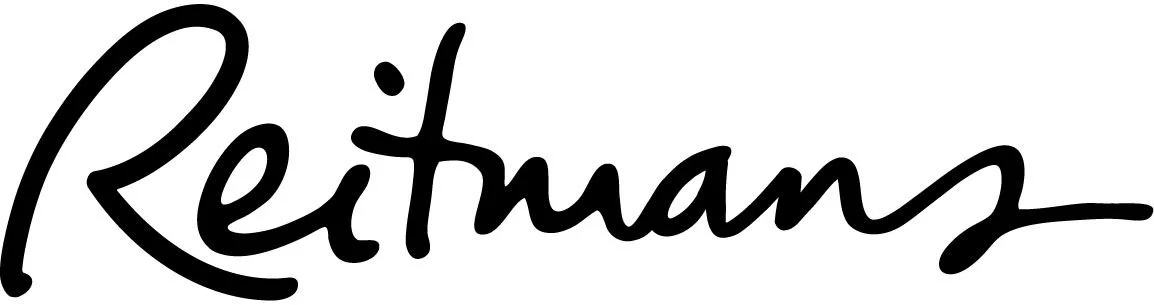 The image shows the "Reitmans" logo written in a bold, black, cursive font on a white background.